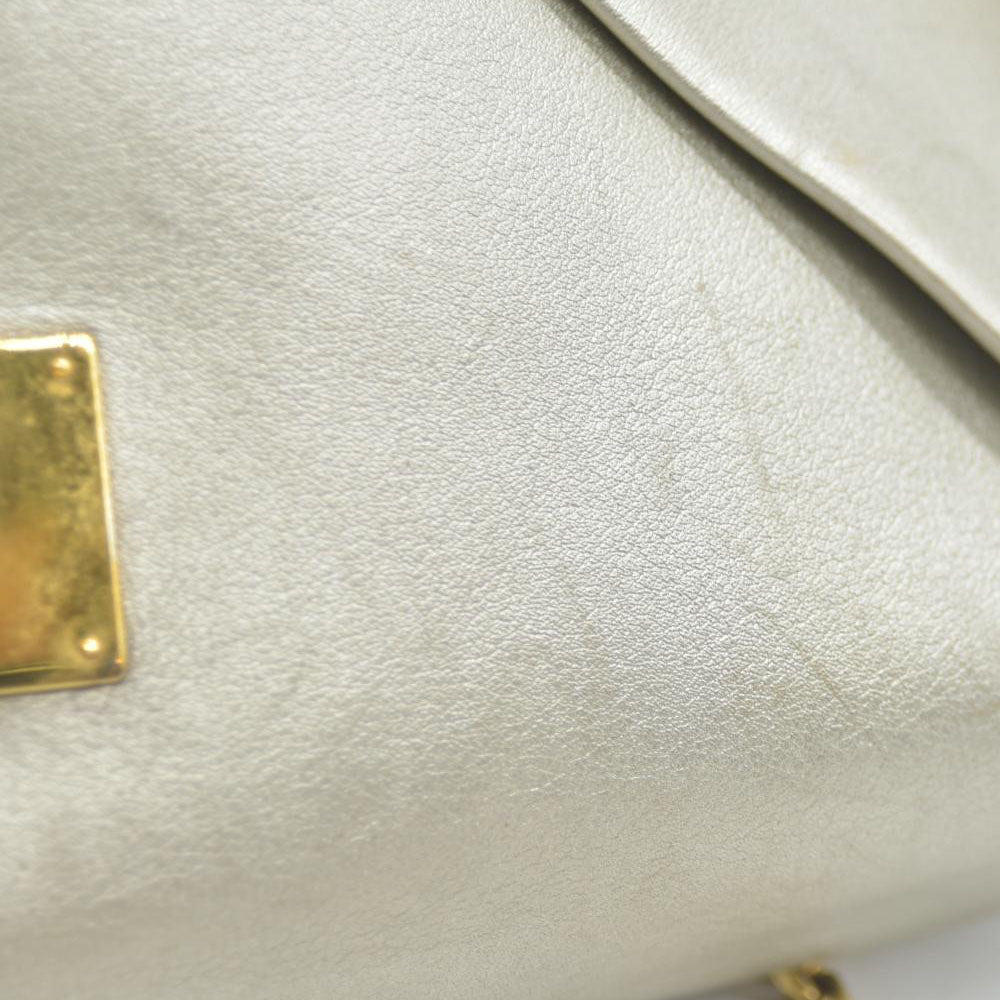 AUCTION $2150 Louis Vuitton Metallic Calfskin Love Note Gold Bronze