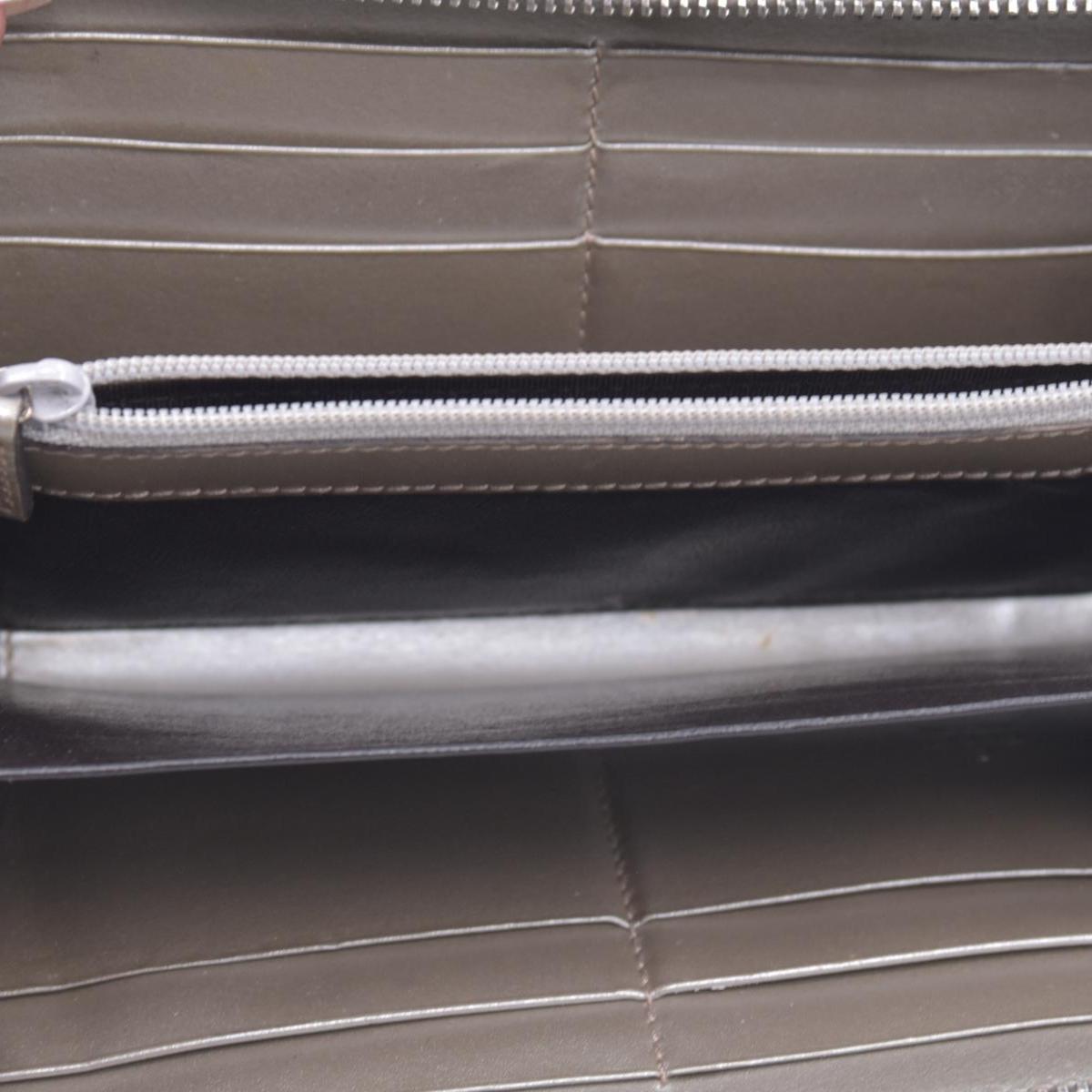 $770 2005 GUCCI GG Monogram Canvas GG Monogram Zip Around Wallet Wallet Metallic Grey CONSIGNMENT 10020940