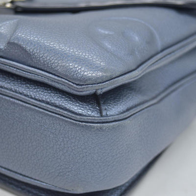 $3100 Louis Vuitton Metallic Empreinte Monogram Giant Pochette Metis Navy Nacre