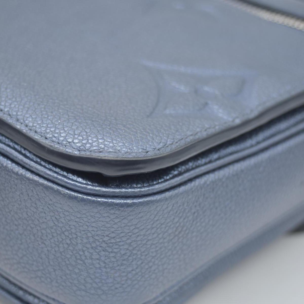 $3100 Louis Vuitton Metallic Empreinte Monogram Giant Pochette Metis Navy Nacre