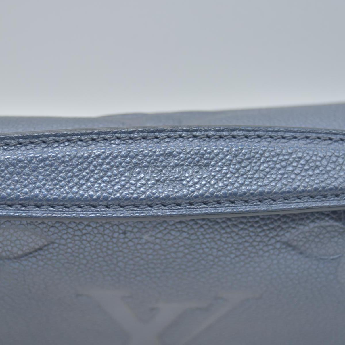 $3100 Louis Vuitton Metallic Empreinte Monogram Giant Pochette Metis Navy Nacre