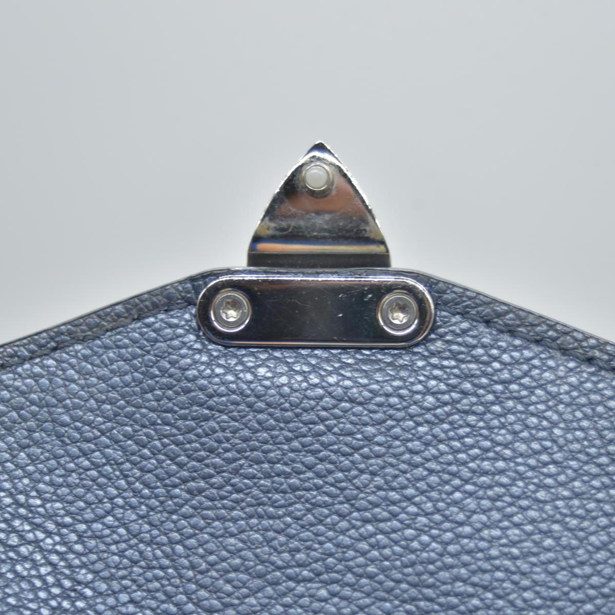 $3100 Louis Vuitton Metallic Empreinte Monogram Giant Pochette Metis Navy Nacre
