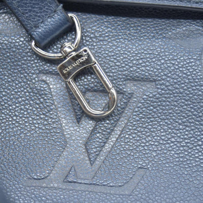 $3100 Louis Vuitton Metallic Empreinte Monogram Giant Pochette Metis Navy Nacre