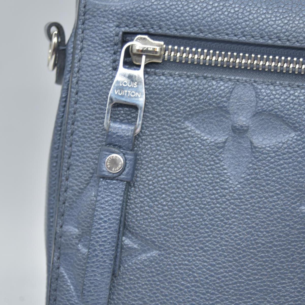 $3100 Louis Vuitton Metallic Empreinte Monogram Giant Pochette Metis Navy Nacre
