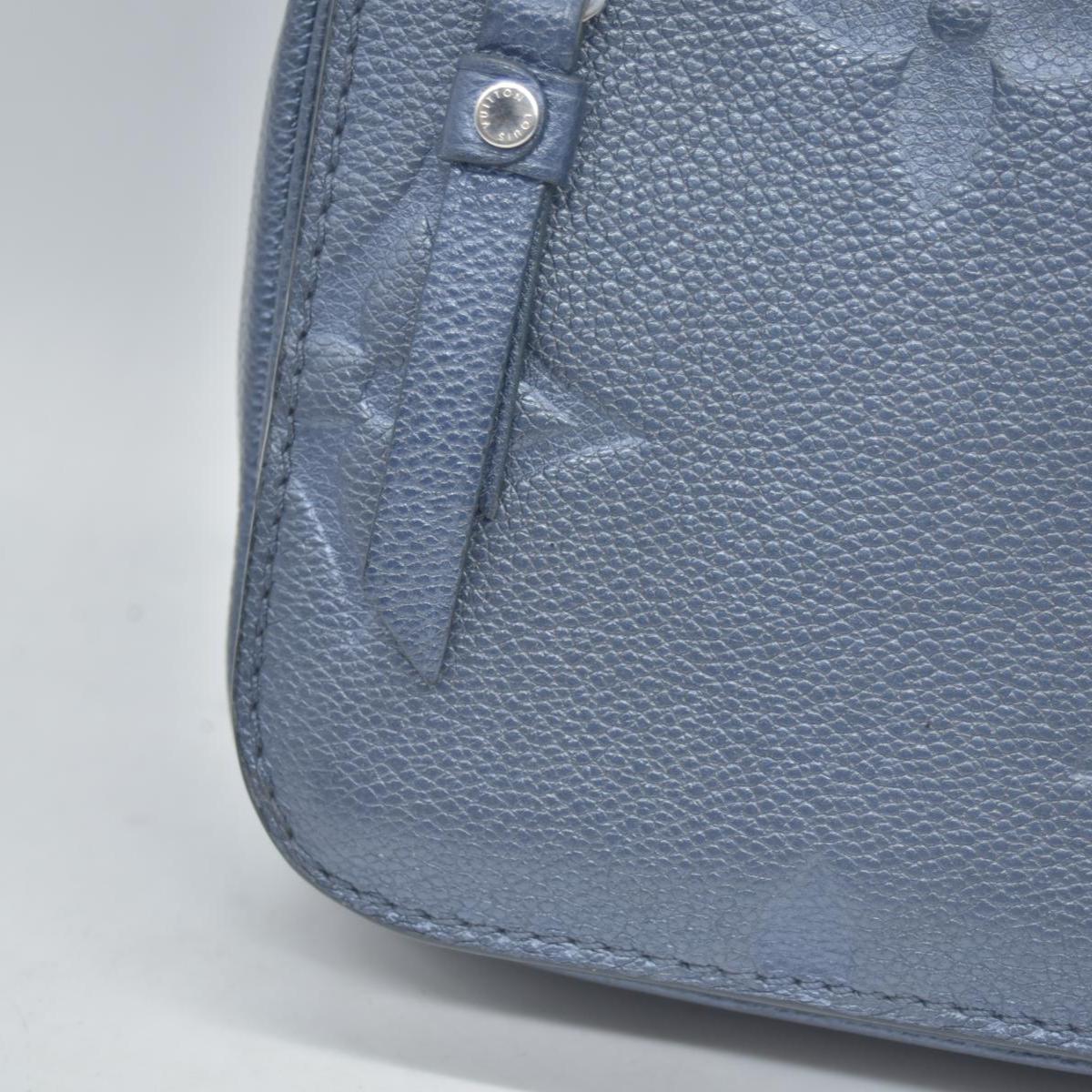 $3100 Louis Vuitton Metallic Empreinte Monogram Giant Pochette Metis Navy Nacre