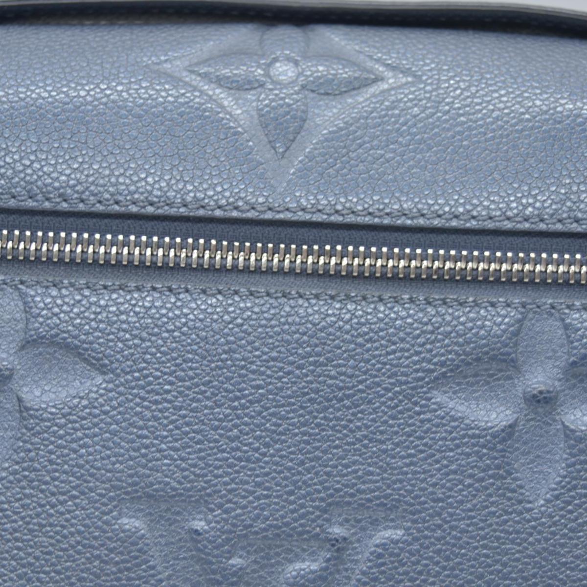 $3100 Louis Vuitton Metallic Empreinte Monogram Giant Pochette Metis Navy Nacre