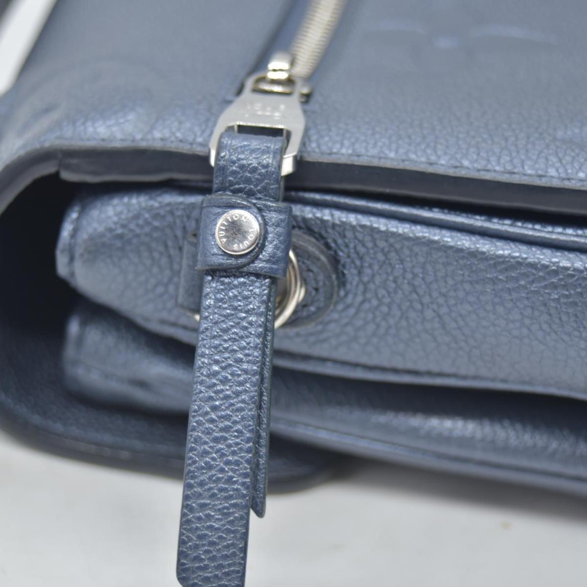 $3100 Louis Vuitton Metallic Empreinte Monogram Giant Pochette Metis Navy Nacre