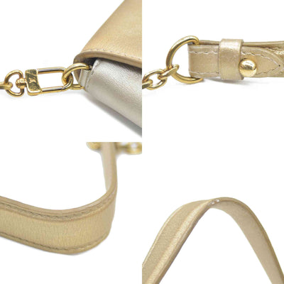 AUCTION $2150 Louis Vuitton Metallic Calfskin Love Note Gold Bronze