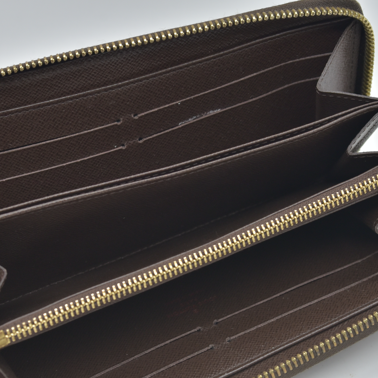 $915 2012 Louis Vuitton Damier Ebene Zippy Wallet CA2162