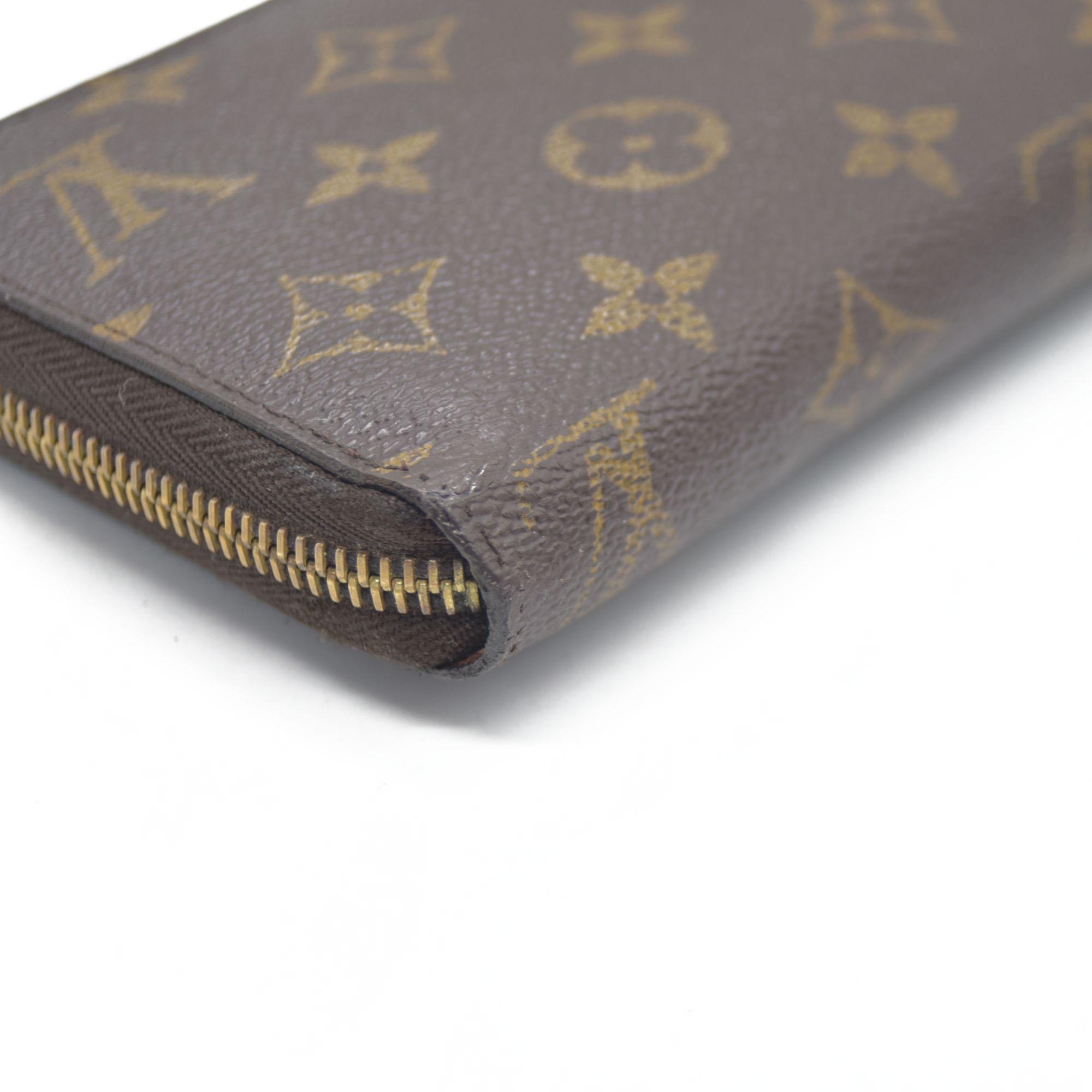 $915 Louis Vuitton Monogram Zippy Wallet GI8112