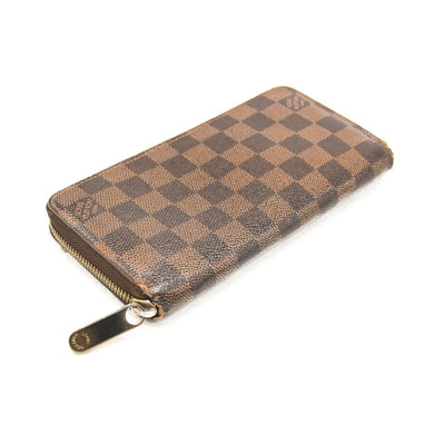 $940 2009 LOUIS VUITTON Damier Ebene Zippy Wallet CA0059 CONSIGNMENT