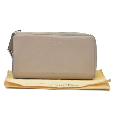 $1420 Louis Vuitton  Veau Cachemire Comete Wallet Galet MI5126