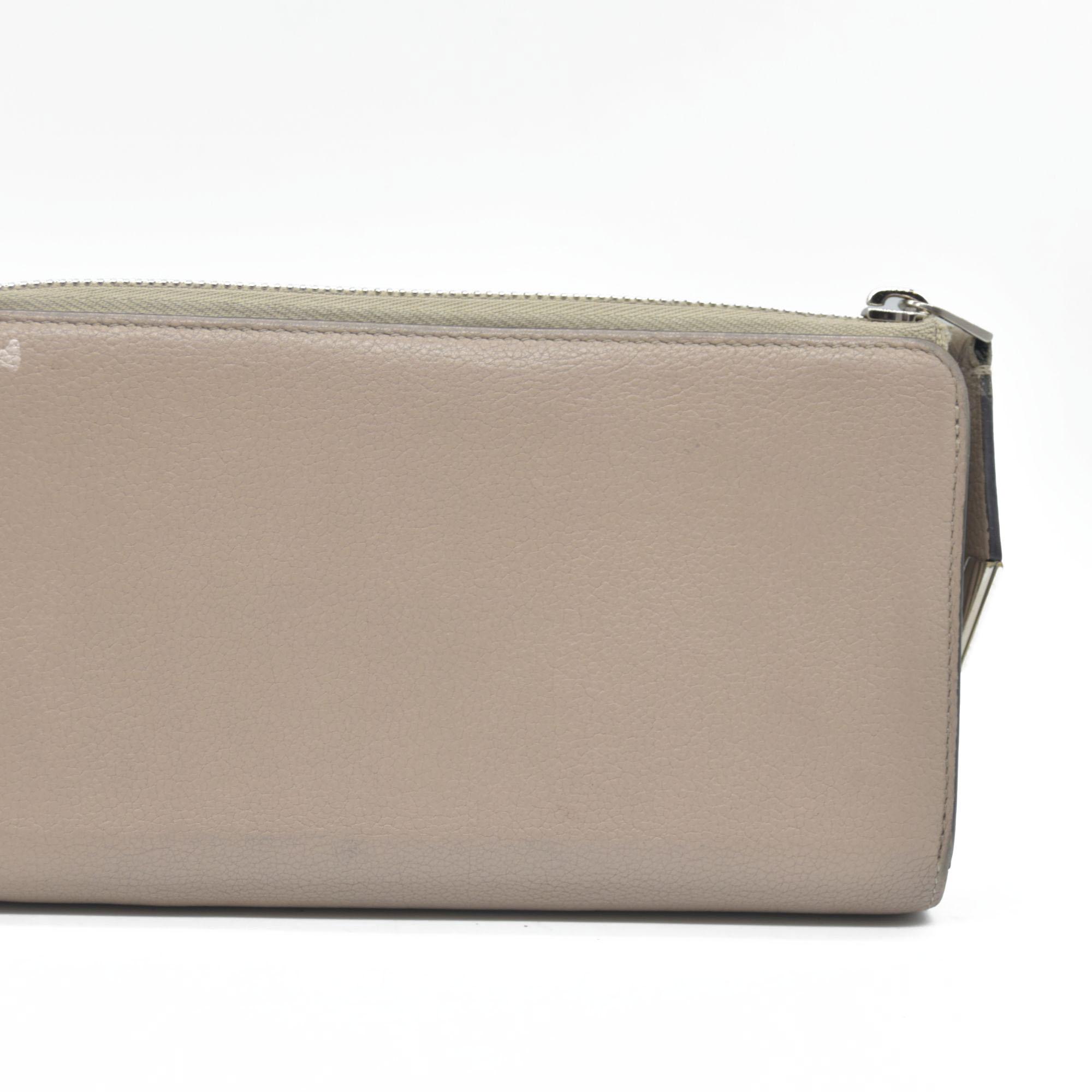 $1420 Louis Vuitton  Veau Cachemire Comete Wallet Galet MI5126