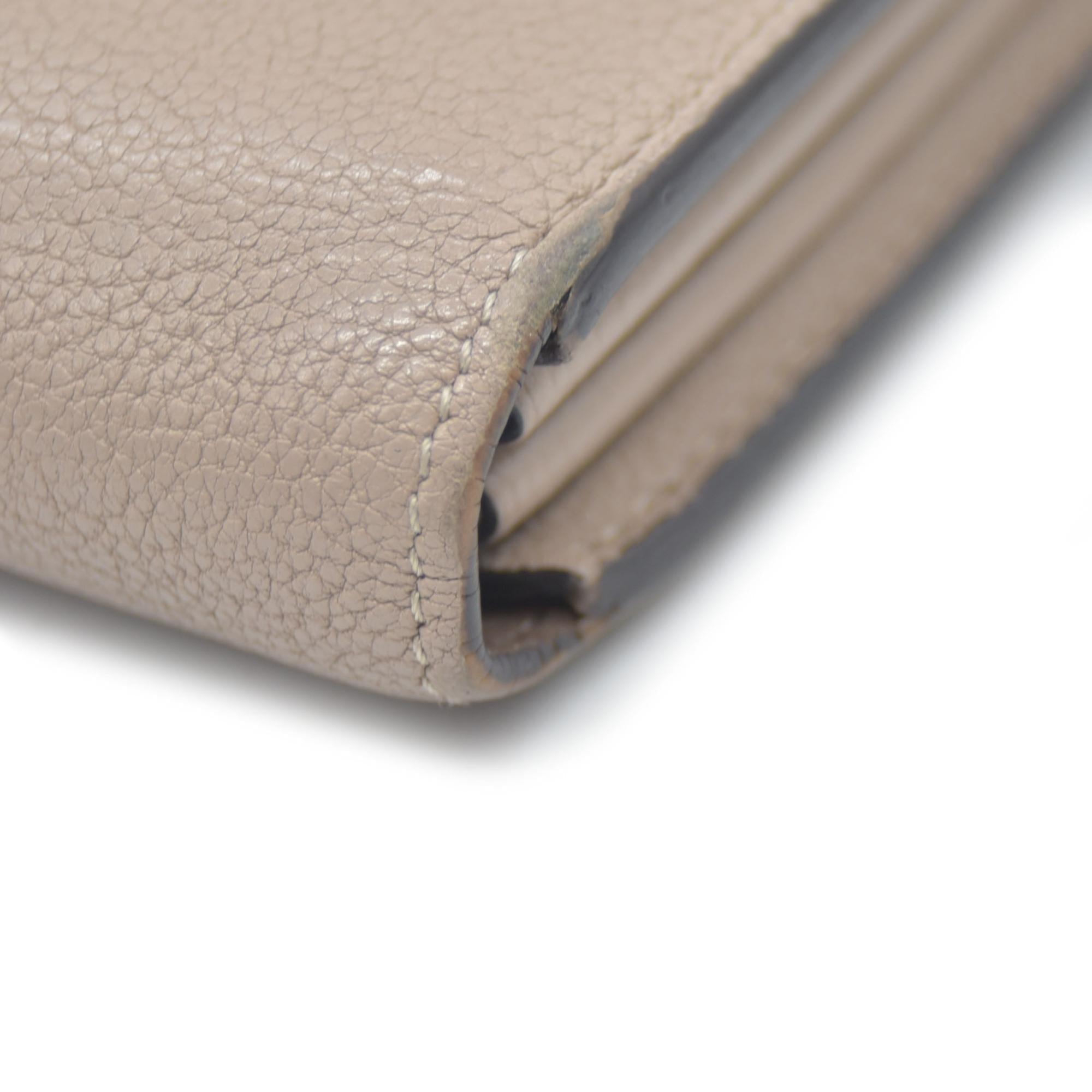 $1420 Louis Vuitton  Veau Cachemire Comete Wallet Galet MI5126