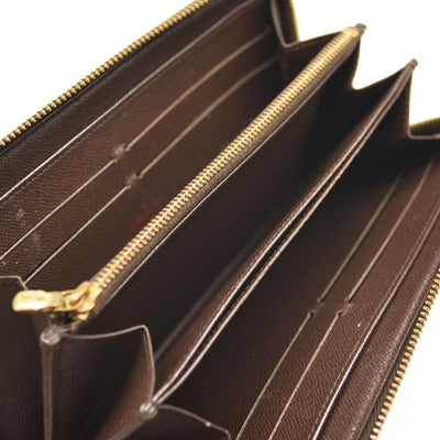 $940 2009 LOUIS VUITTON Damier Ebene Zippy Wallet CA0059 CONSIGNMENT
