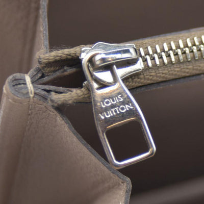 $1420 Louis Vuitton  Veau Cachemire Comete Wallet Galet MI5126