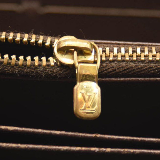 $940 2009 LOUIS VUITTON Damier Ebene Zippy Wallet CA0059 CONSIGNMENT