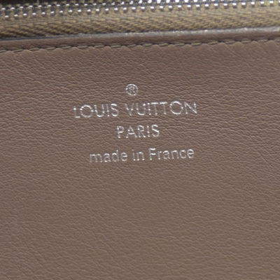 $1420 Louis Vuitton  Veau Cachemire Comete Wallet Galet MI5126