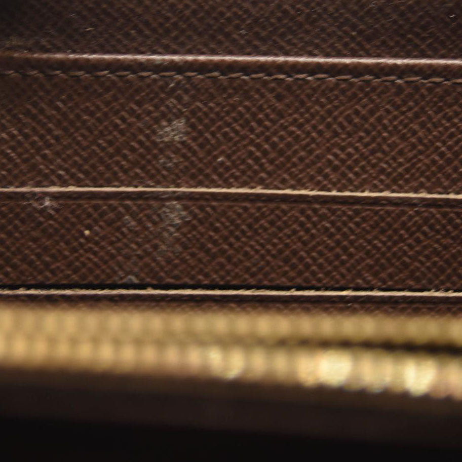$940 2009 LOUIS VUITTON Damier Ebene Zippy Wallet CA0059 CONSIGNMENT