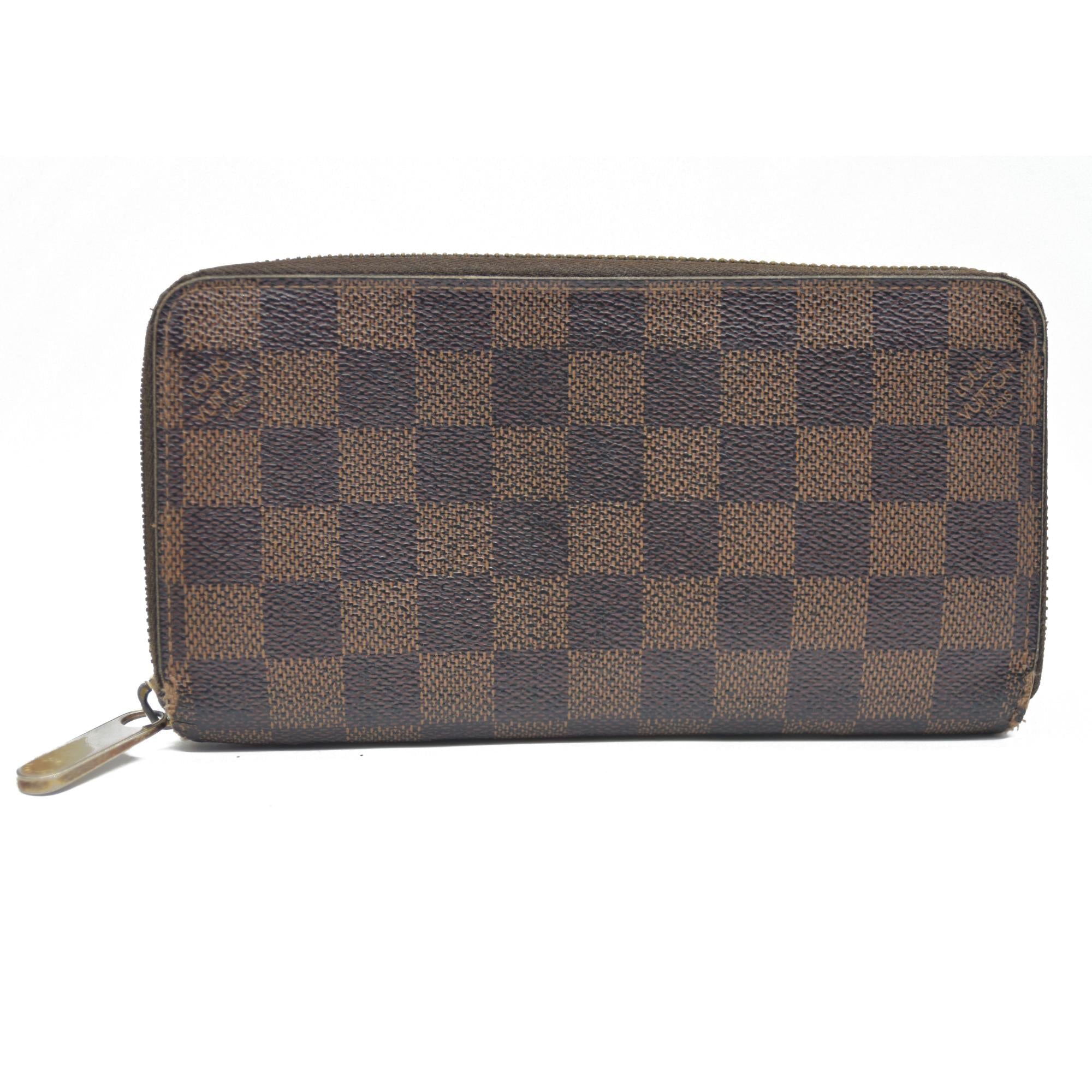 $915 Louis Vuitton Damier Ebene Zippy Wallet CA5009