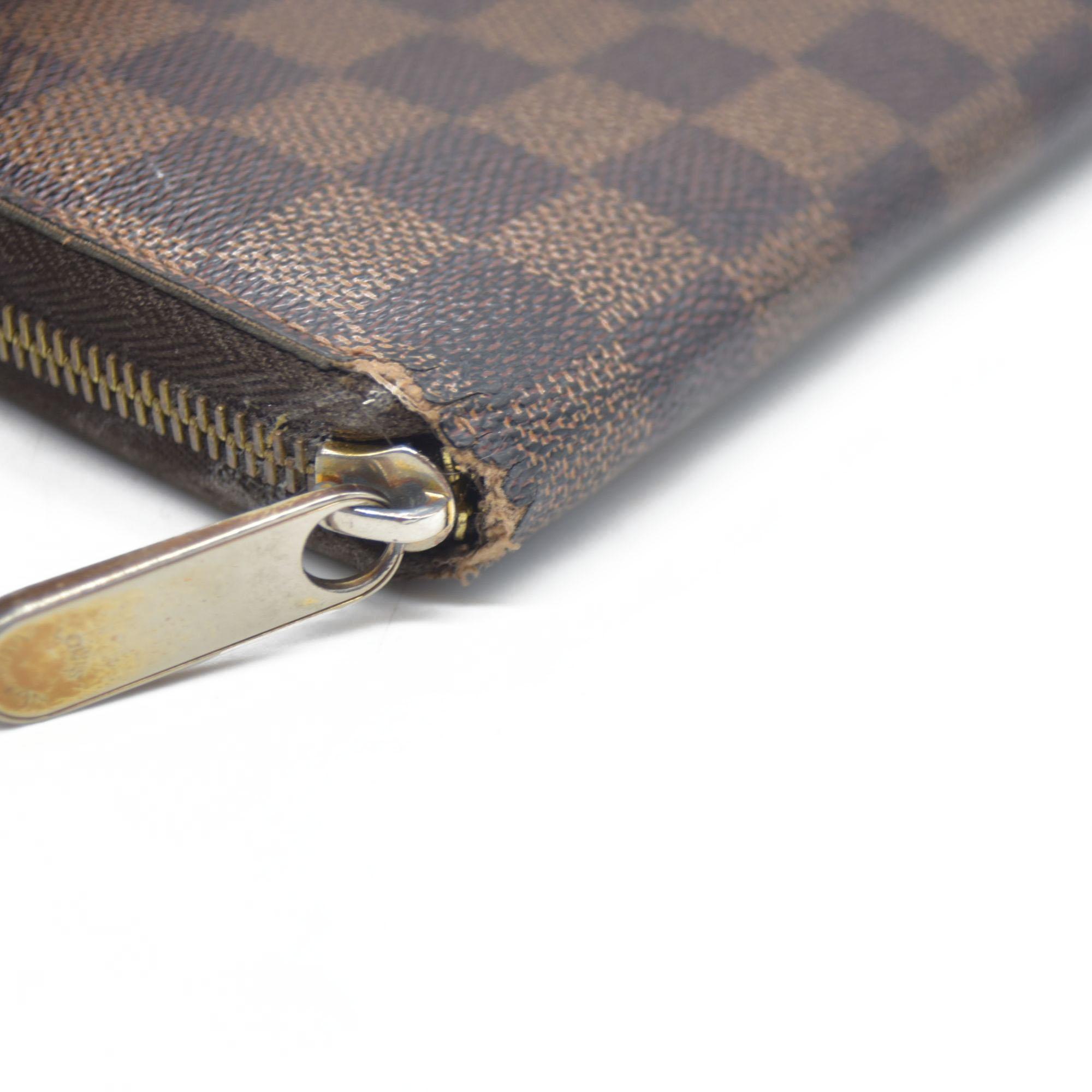 $915 Louis Vuitton Damier Ebene Zippy Wallet CA5009
