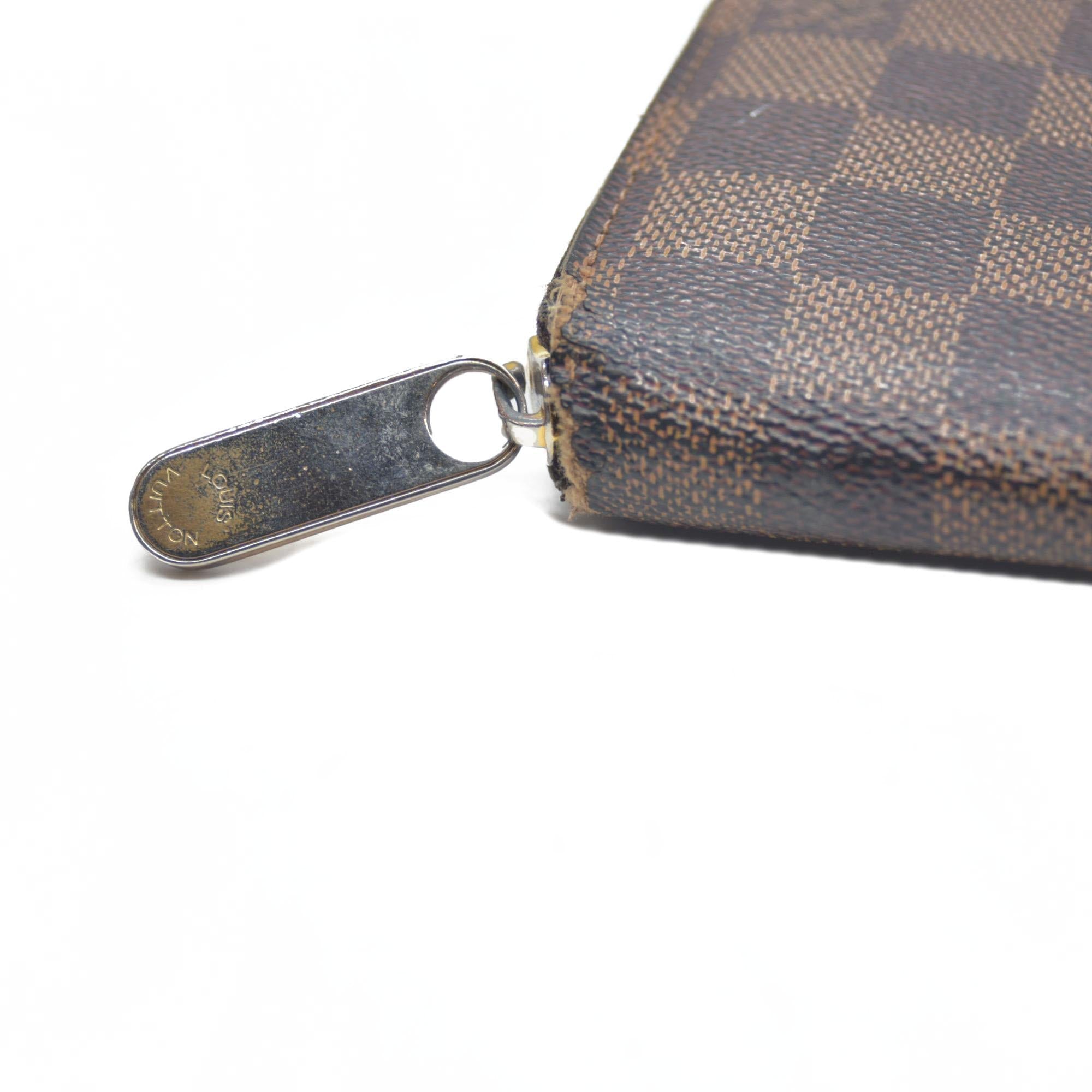 $915 Louis Vuitton Damier Ebene Zippy Wallet CA5009