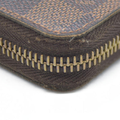 $915 Louis Vuitton Damier Ebene Zippy Wallet CA5009