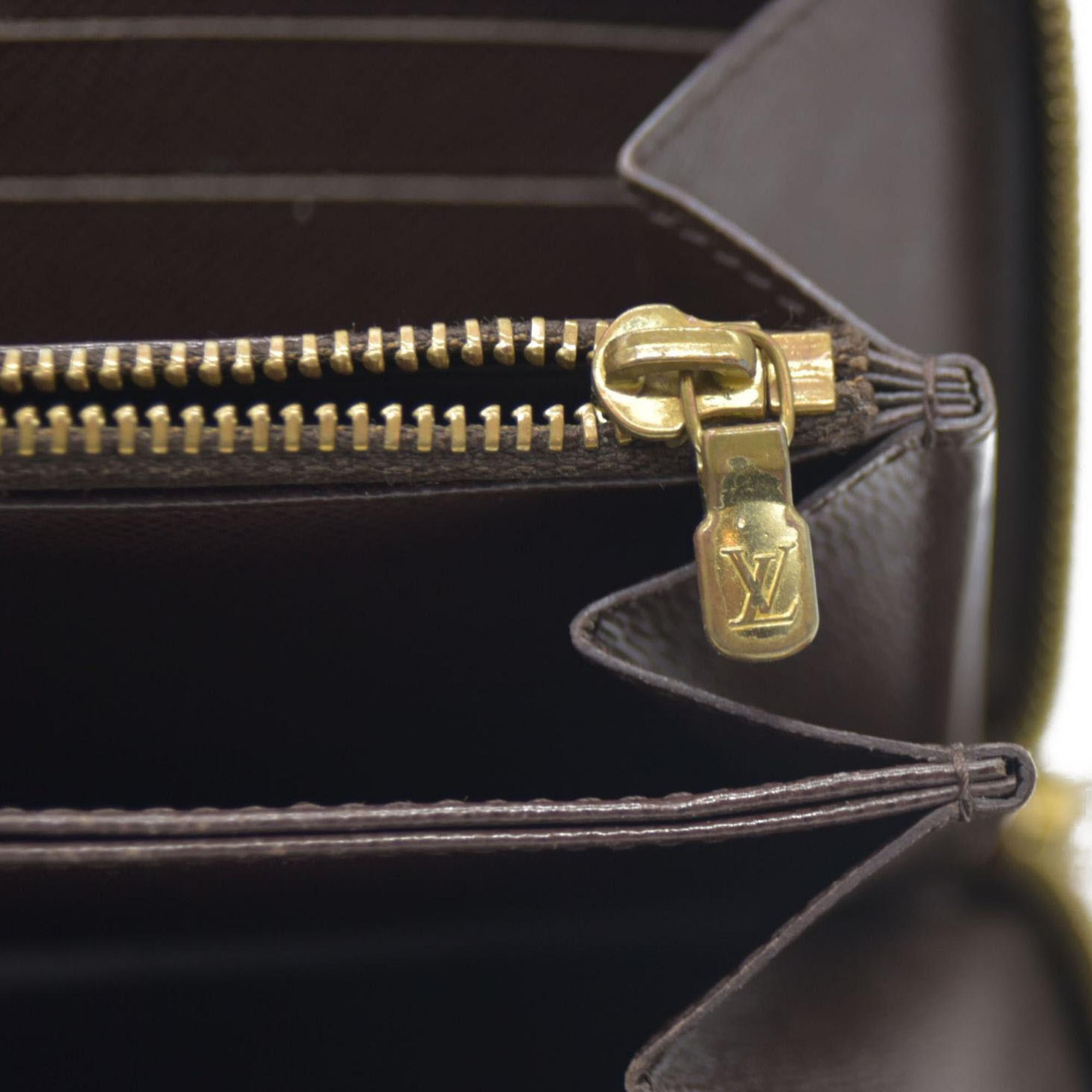 $915 Louis Vuitton Damier Ebene Zippy Wallet CA5009