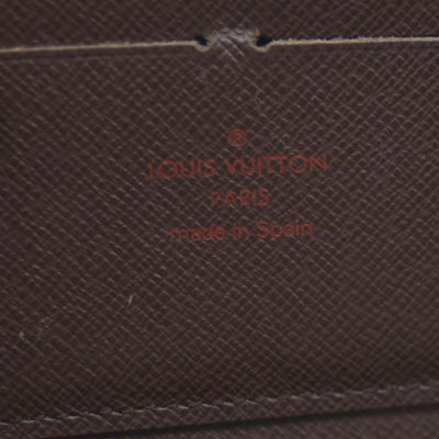 $915 Louis Vuitton Damier Ebene Zippy Wallet CA5009