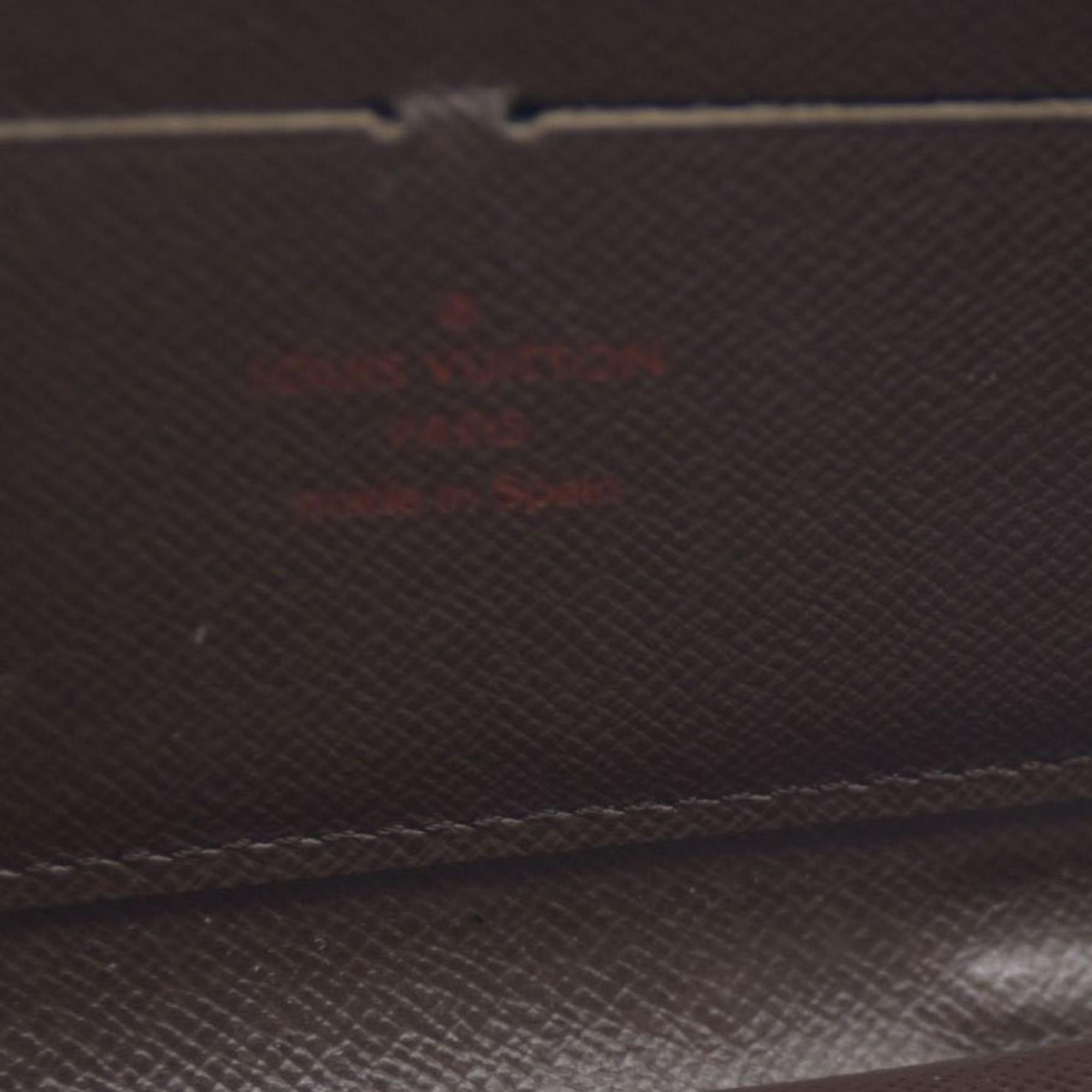 $915 Louis Vuitton Damier Ebene Zippy Wallet CA5009