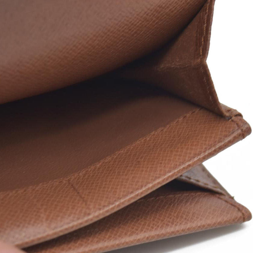 $545 Louis Vuitton  Monogram Porte-Monnaie Coin Purse RA0920