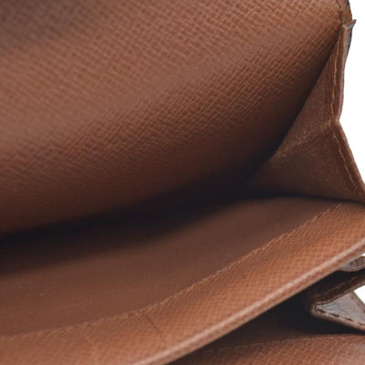 $545 Louis Vuitton  Monogram Porte-Monnaie Coin Purse RA0920