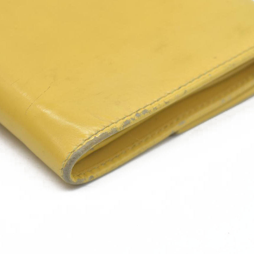 Salvatore Ferragamo Gancini Leather Trifold Wallet Yellow