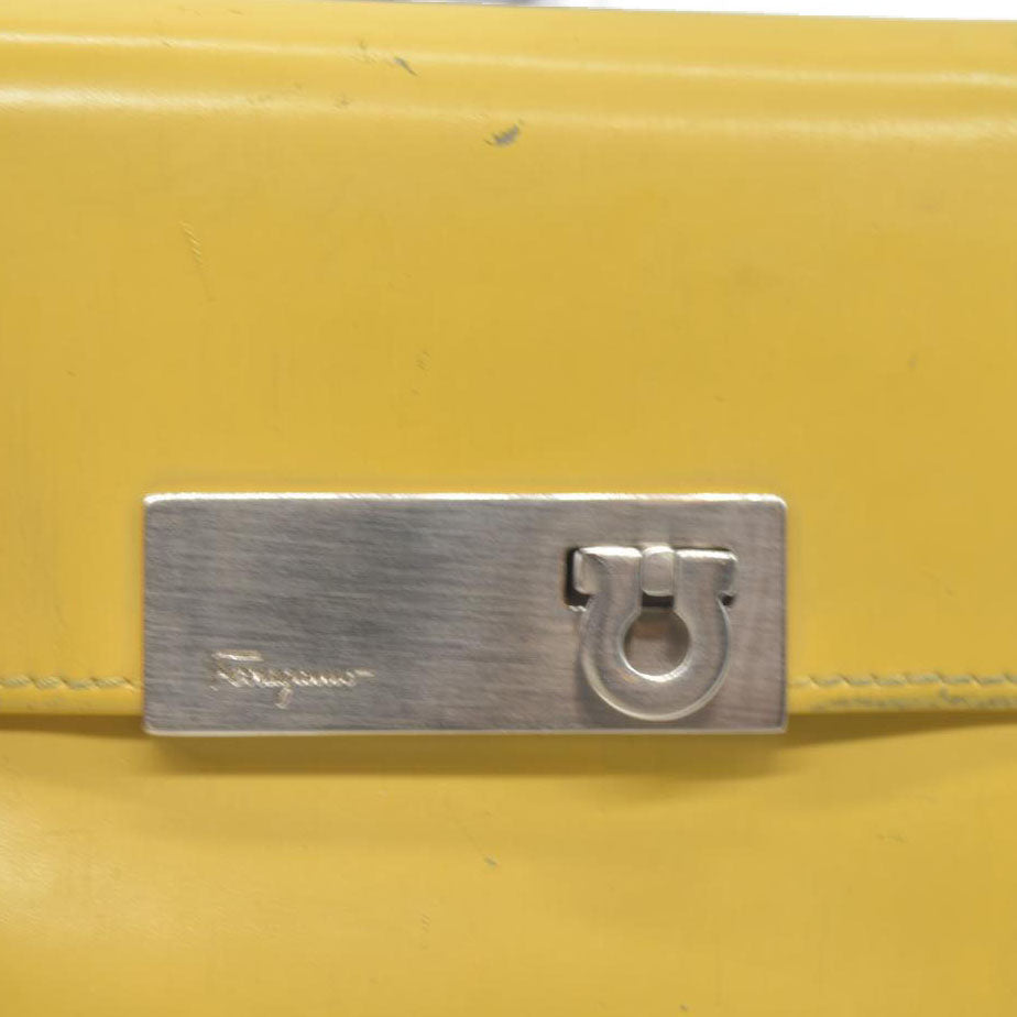 Salvatore Ferragamo Gancini Leather Trifold Wallet Yellow