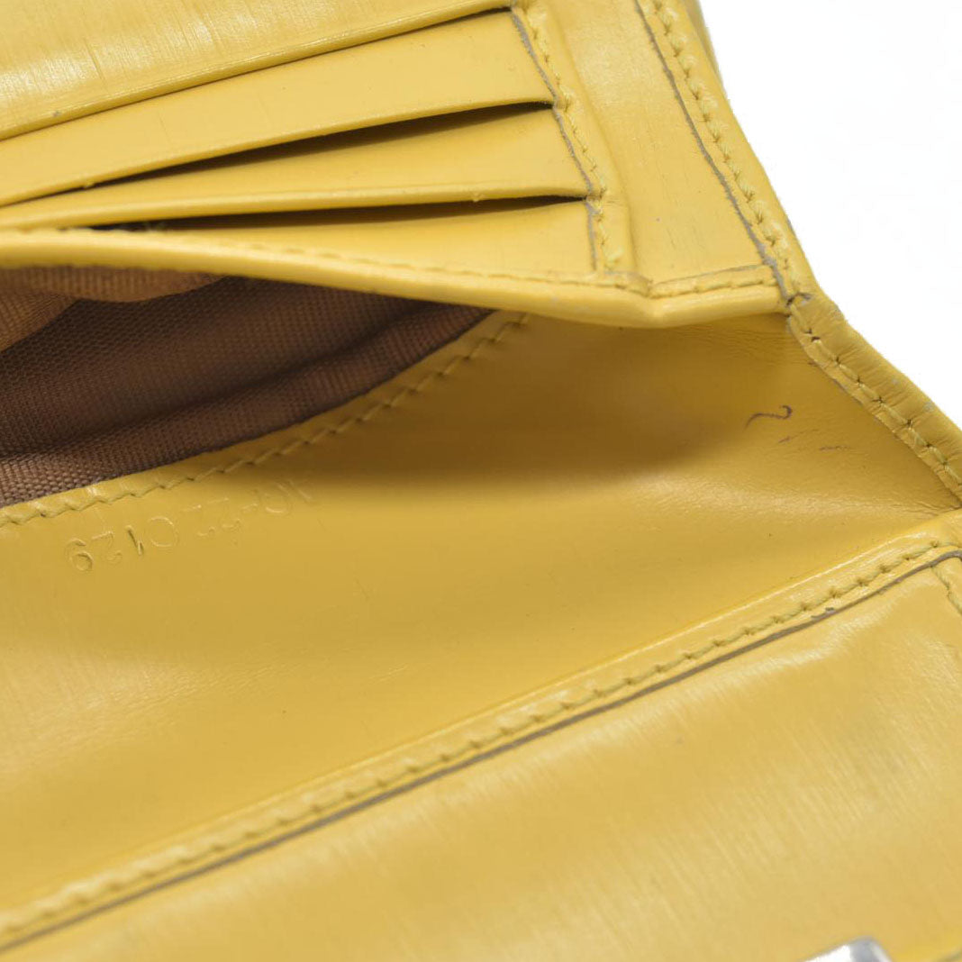 Salvatore Ferragamo Gancini Leather Trifold Wallet Yellow