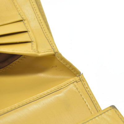 Salvatore Ferragamo Gancini Leather Trifold Wallet Yellow