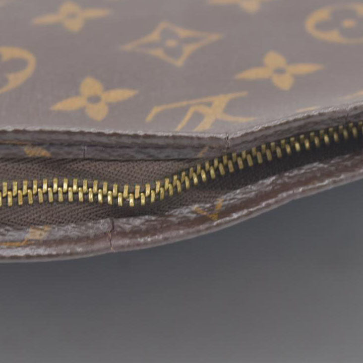 $1070 Louis Vuitton Monogram Toiletry 26