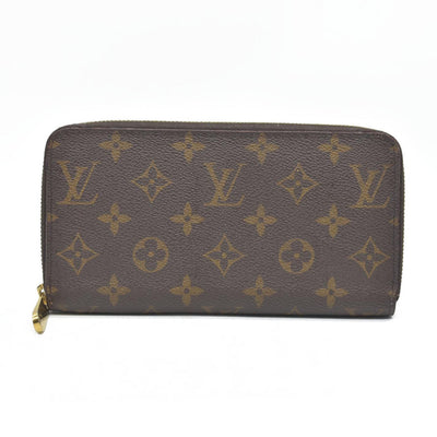 $915 Louis Vuitton  Monogram Zippy Wallet