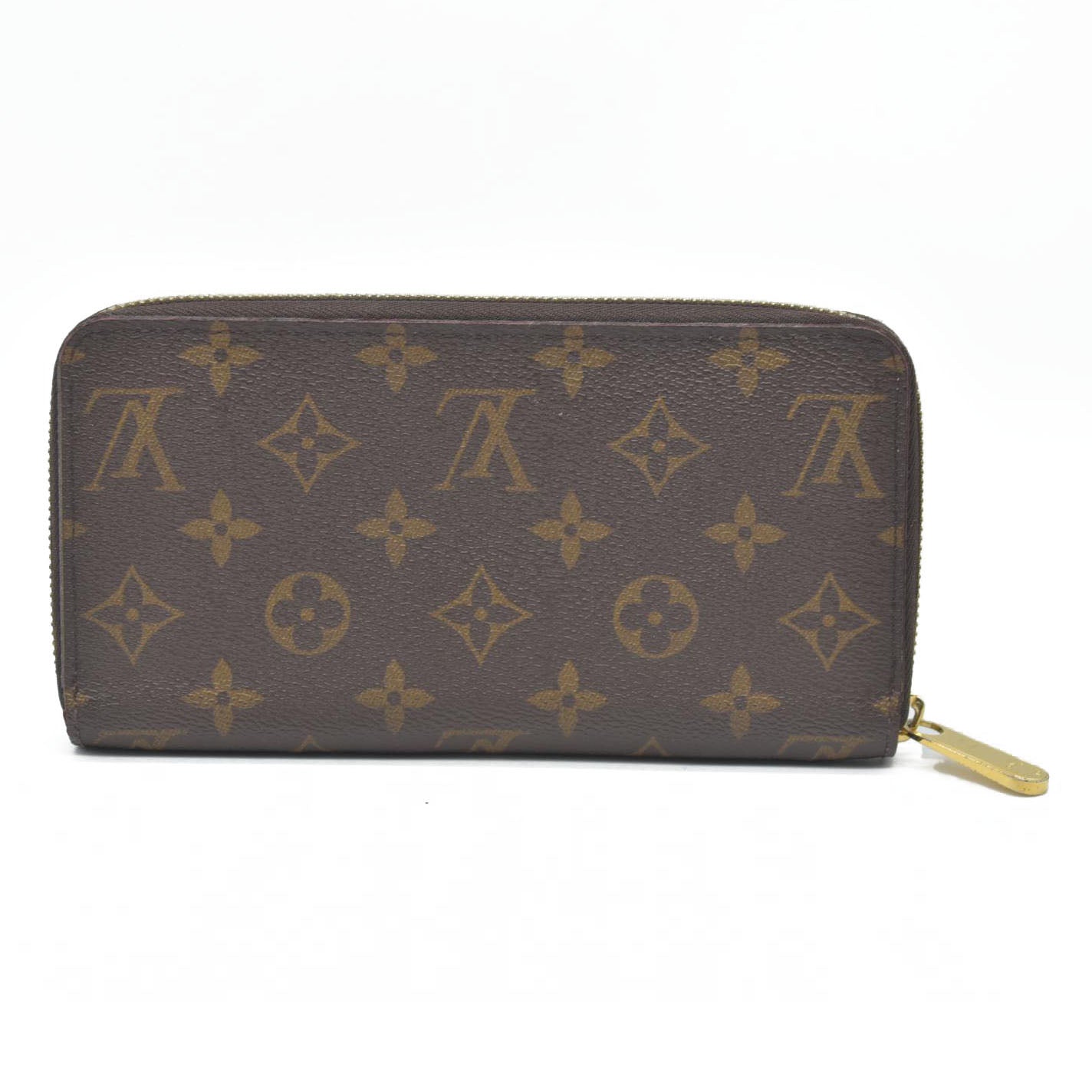 $915 Louis Vuitton  Monogram Zippy Wallet