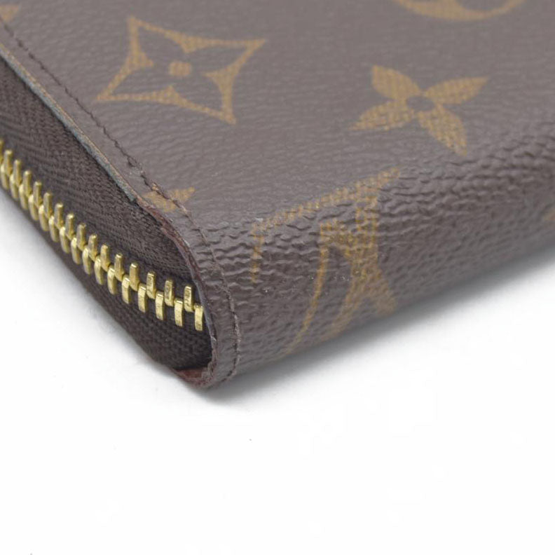 $915 Louis Vuitton  Monogram Zippy Wallet