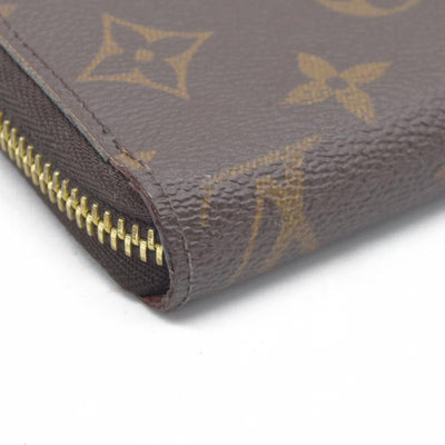 $915 Louis Vuitton  Monogram Zippy Wallet