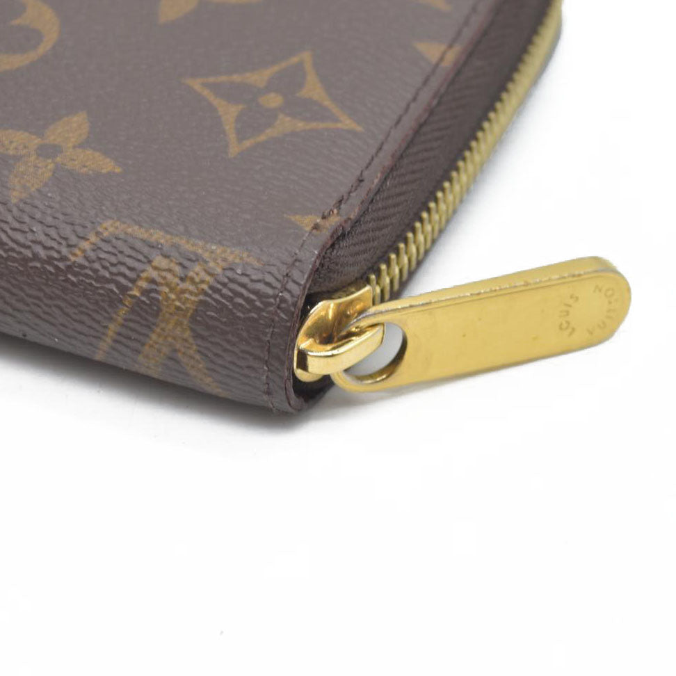 $915 Louis Vuitton  Monogram Zippy Wallet