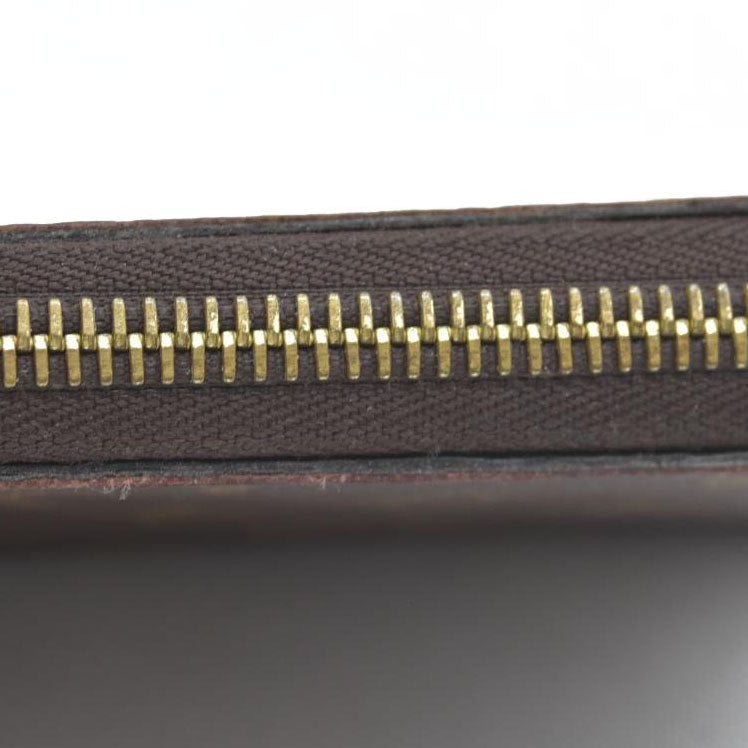 $915 Louis Vuitton  Monogram Zippy Wallet