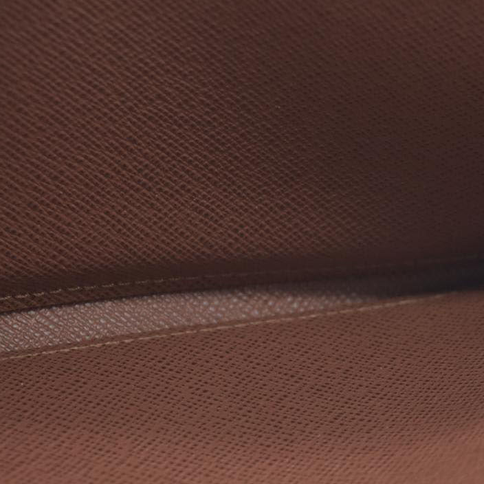 $915 Louis Vuitton  Monogram Zippy Wallet