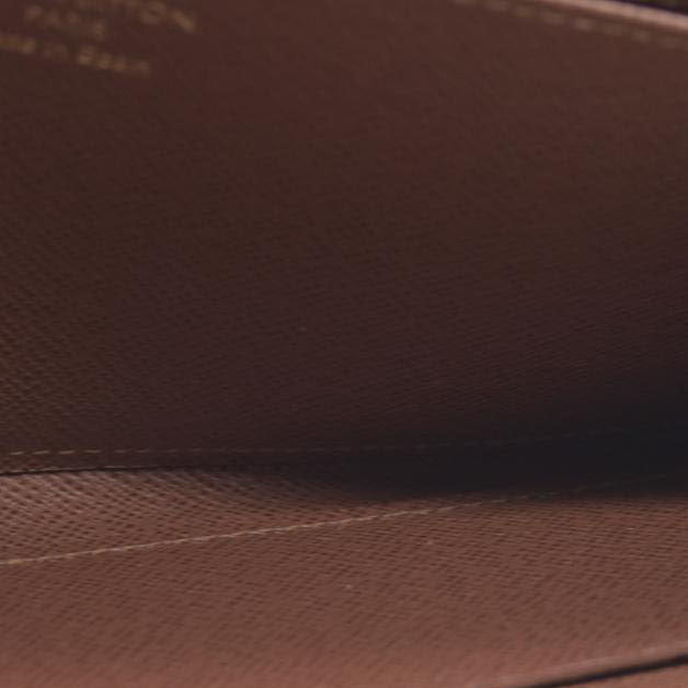 $915 Louis Vuitton  Monogram Zippy Wallet