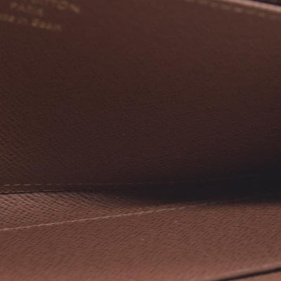 $915 Louis Vuitton  Monogram Zippy Wallet