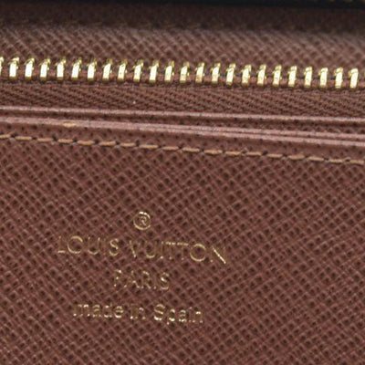 $915 Louis Vuitton  Monogram Zippy Wallet