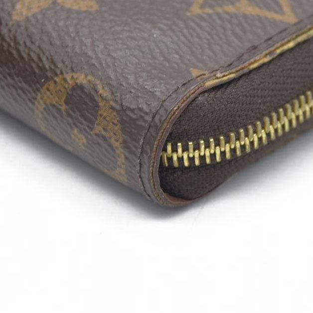 Louis Vuitton  Monogram Zippy Coin Purse $545