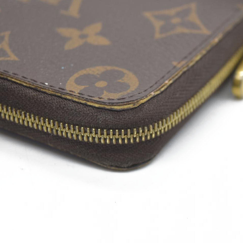 Louis Vuitton  Monogram Zippy Coin Purse $545