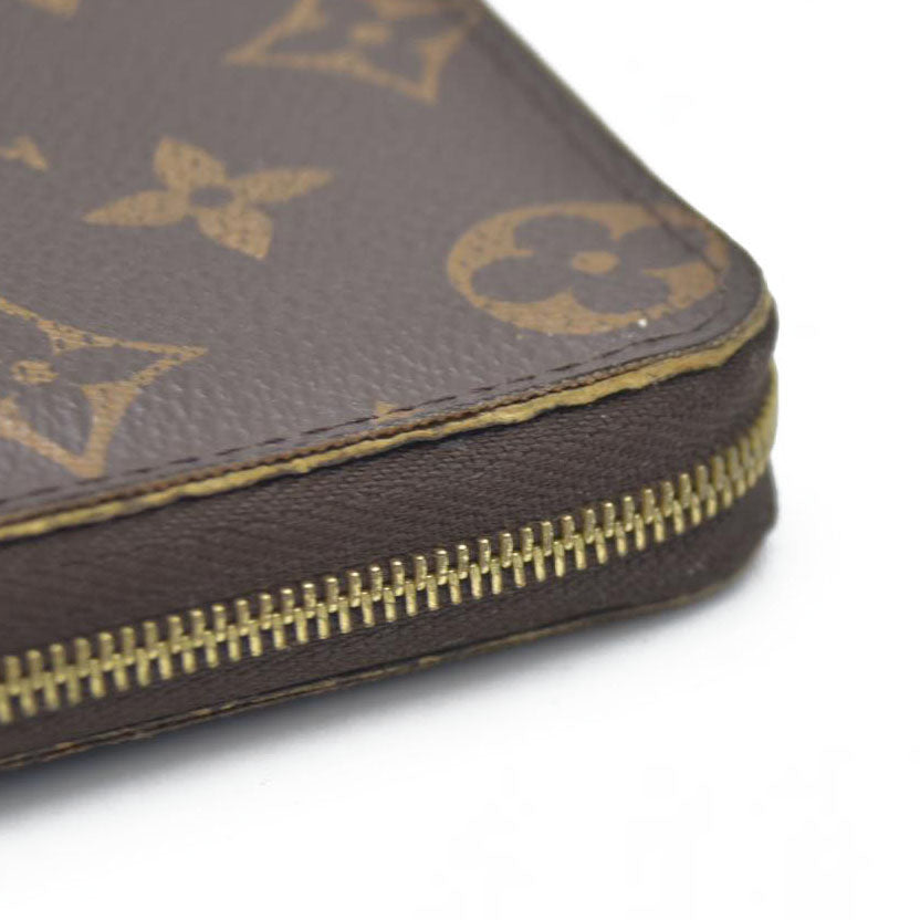 Louis Vuitton  Monogram Zippy Coin Purse $545